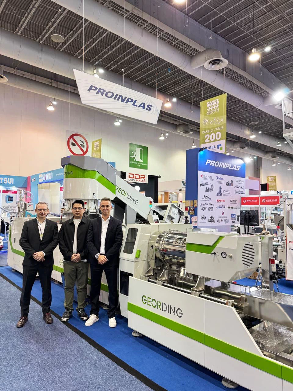 Group photo with customers at the booth